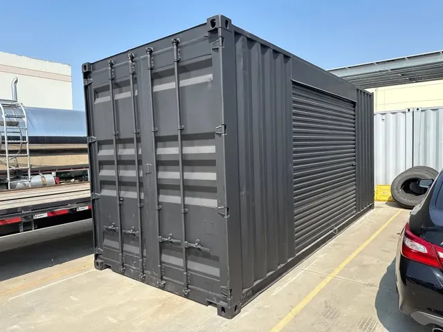 20ft Used Shipping Container - Matte Black w/ 12 Side Roll-Up Door for sale at Ironyard